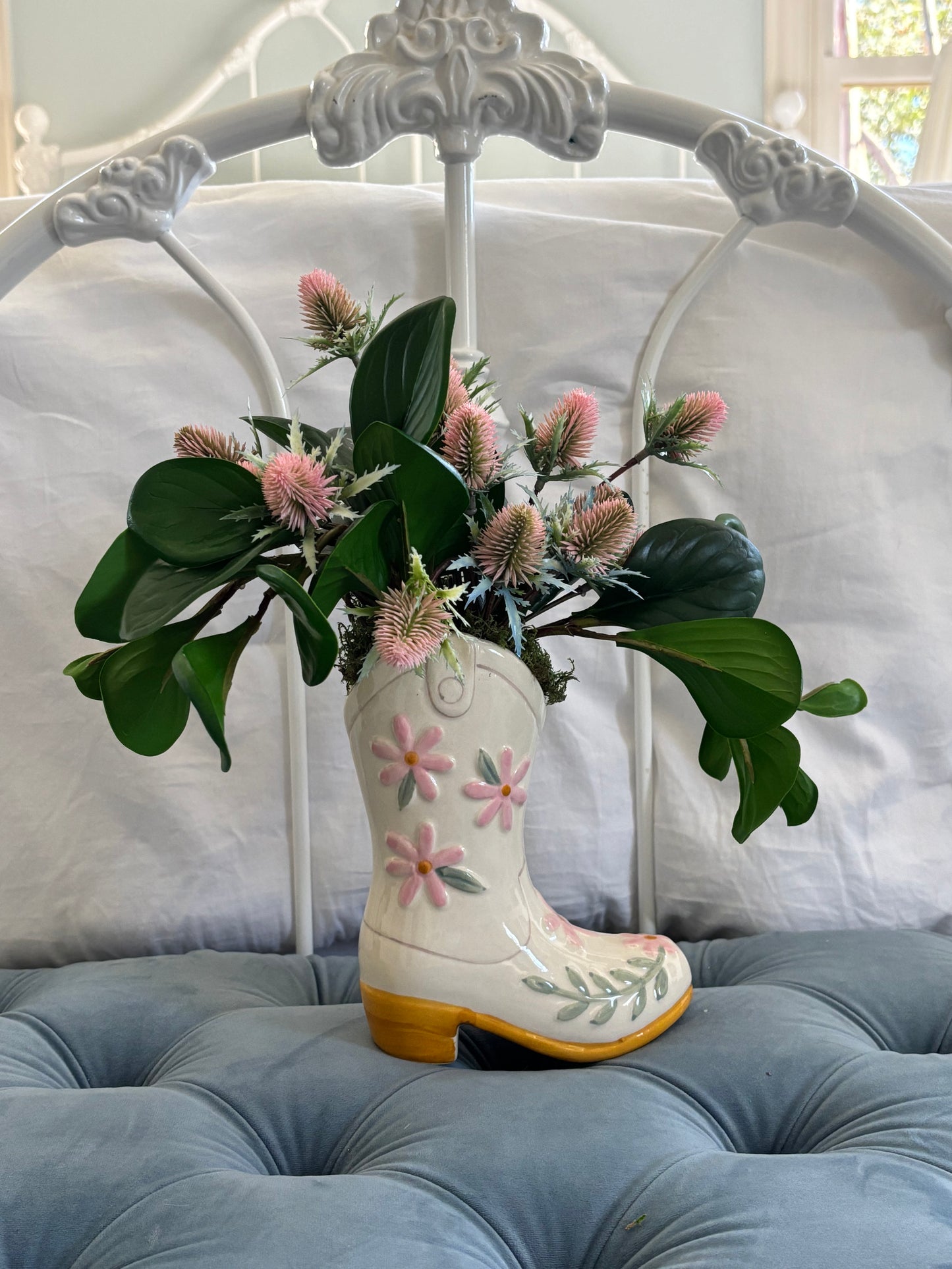 boot vase with florals