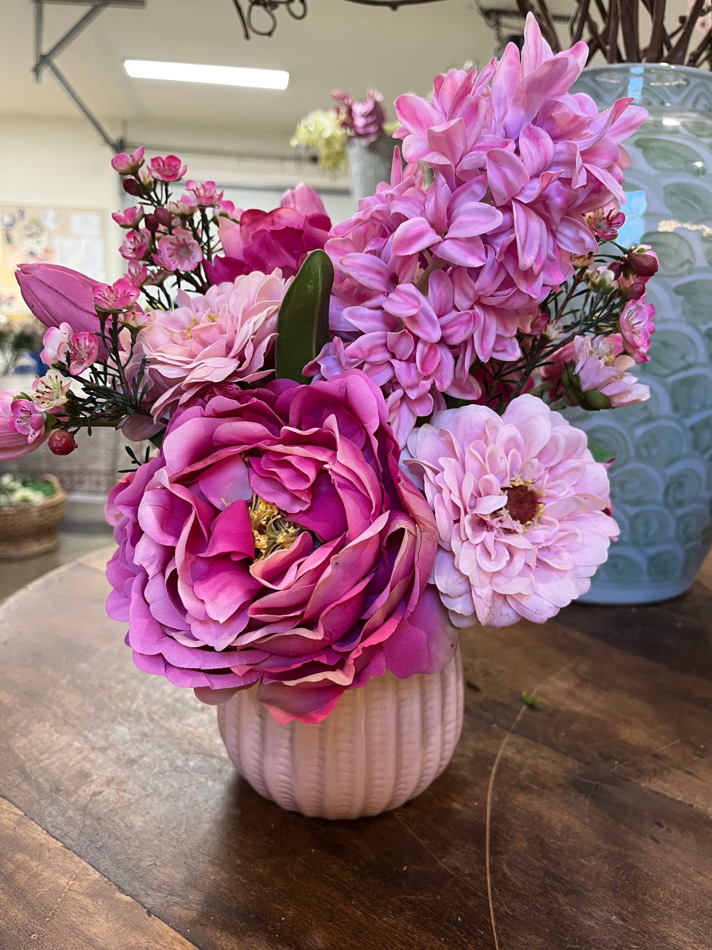 pink faux florals in ceramic pink vase